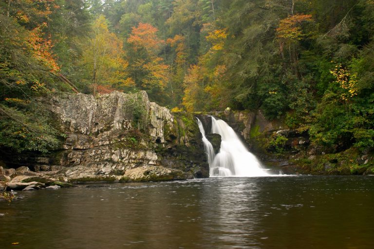 Abrams Falls surrounded by autumn forest near Cades Cove